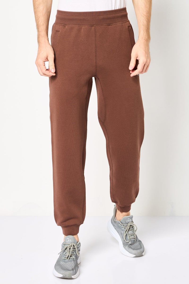 PUMA سروال رياضي للرجال مناسب في الهواء الطلق، بني - Image 1