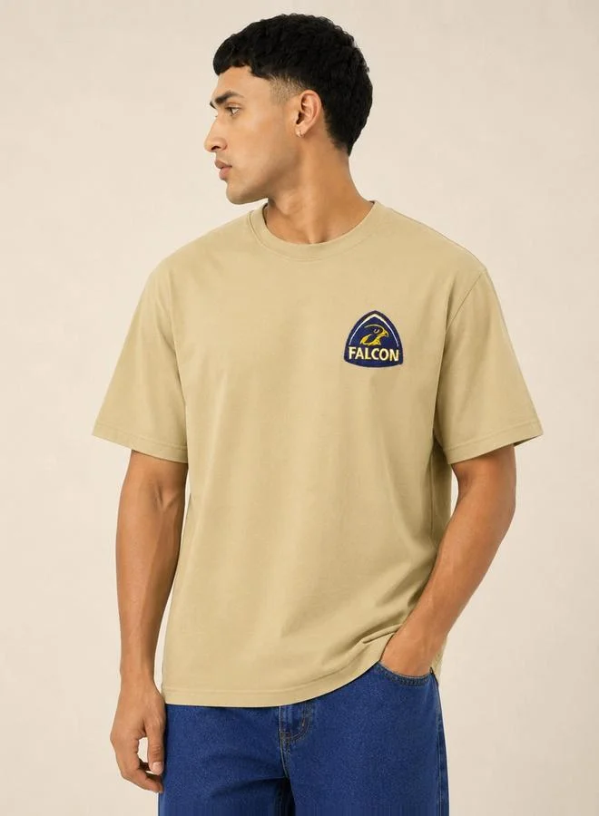 تايك تو Beige Racer Vibes Graphic Crew Neck T-Shirt By Falcon
