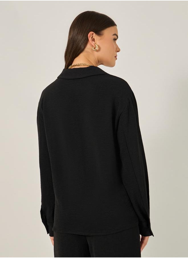 Solid Oversized Wrap Blouse with Notch collar Detail - pzsku/Z4AA16B352D795862C1A3Z/45/_/1738970564/f5d271bd-4041-422a-892f-9761303310a5