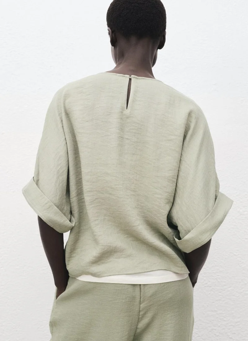 مانجو Oversized blouse with turn-up sleeves