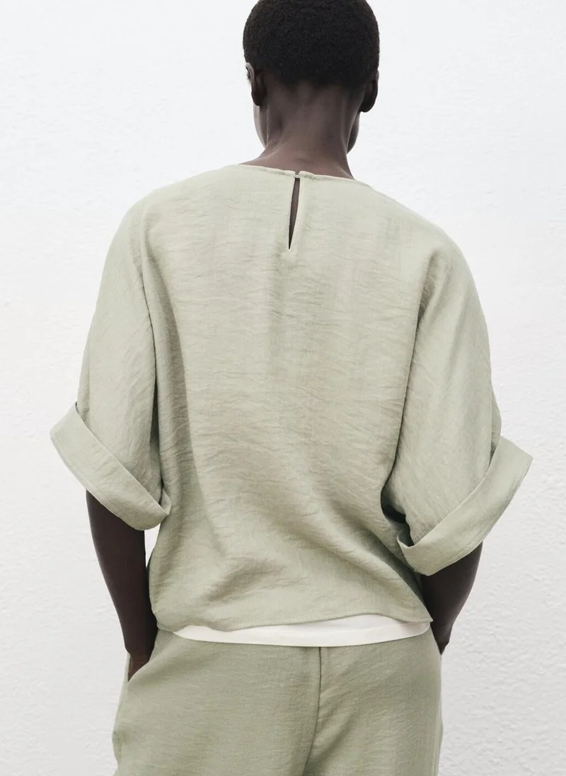 MANGO Oversized blouse with turn-up sleeves