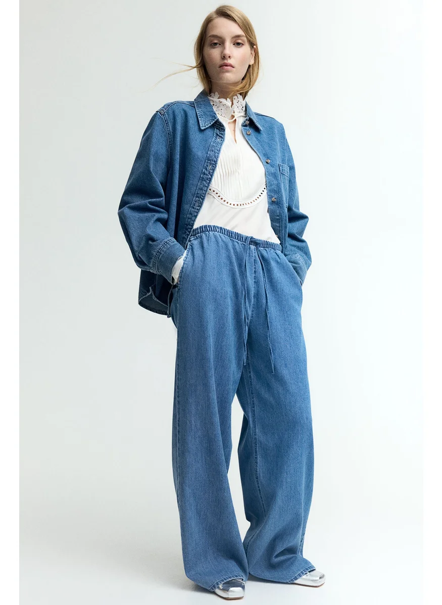 H&M FEATHER SOFT DENIM DRAWSTRING TROUSERS