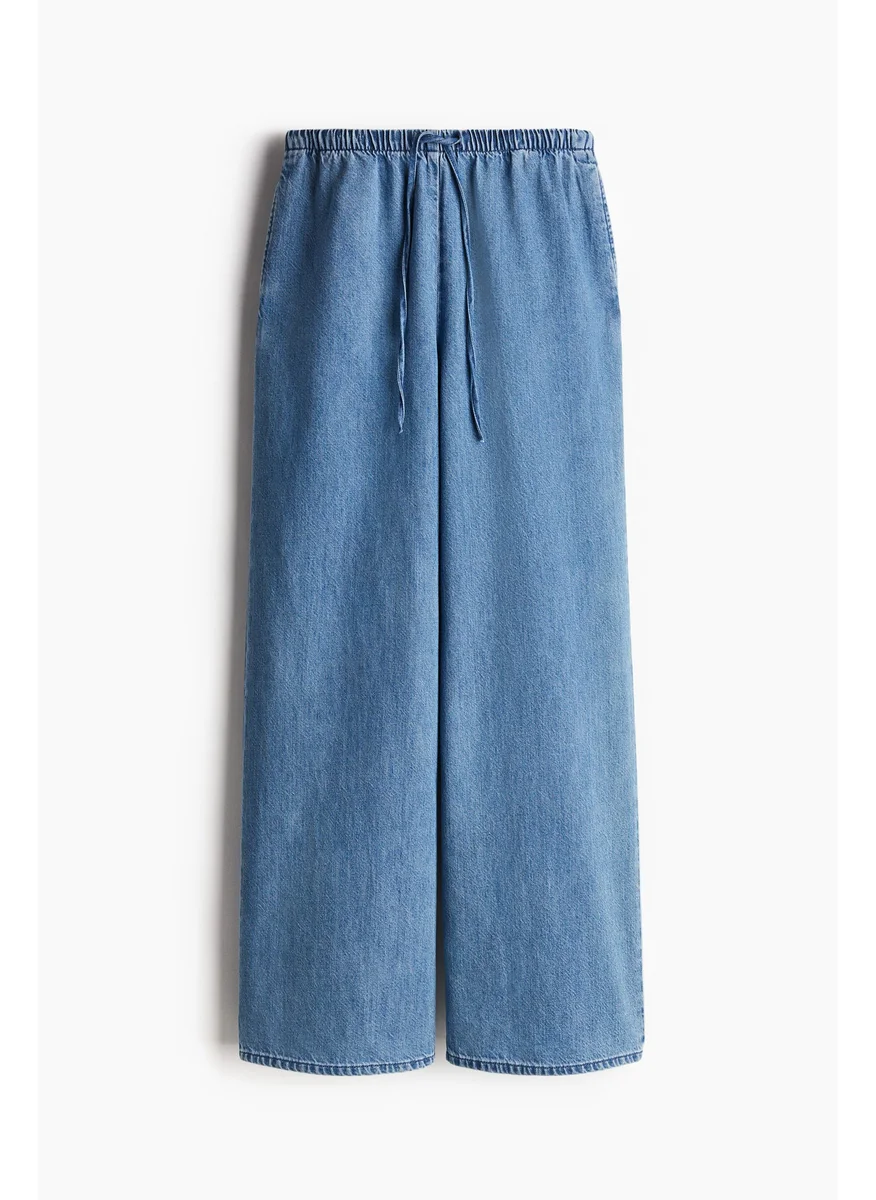 H&M FEATHER SOFT DENIM DRAWSTRING TROUSERS