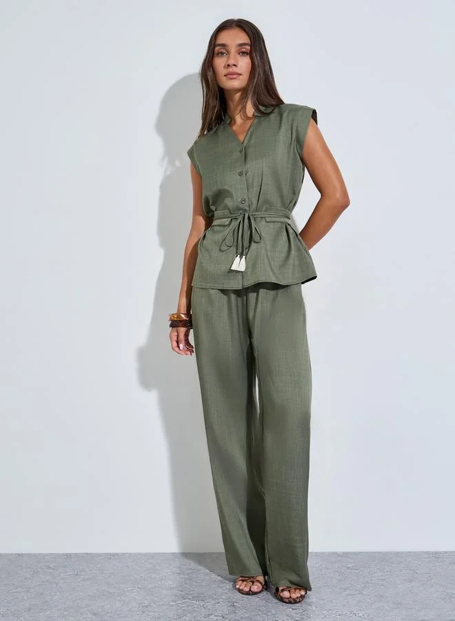 ستايلي Green V Neck Solid Top with Belt and Wide Leg Pants Co-Ords
