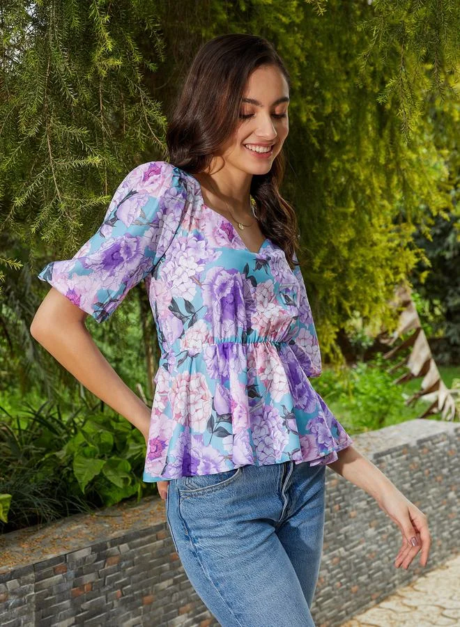 SASSAFRAS SASSAFRAS Floral Print Back Criss Cross Tie Peplum Top