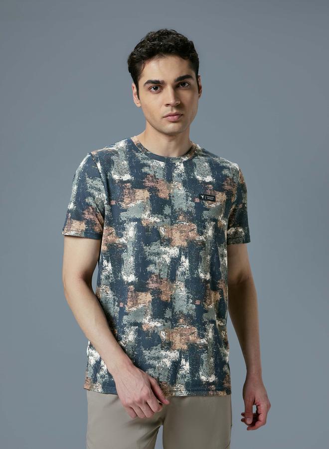 تكنوسبورت تيشيرت تكنوسبورت بقصة ضيقة وطبعة شاملة - Image 1