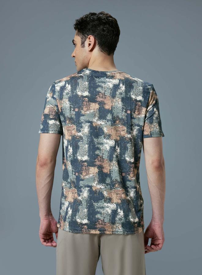 تكنوسبورت تيشيرت تكنوسبورت بقصة ضيقة وطبعة شاملة - Image 4