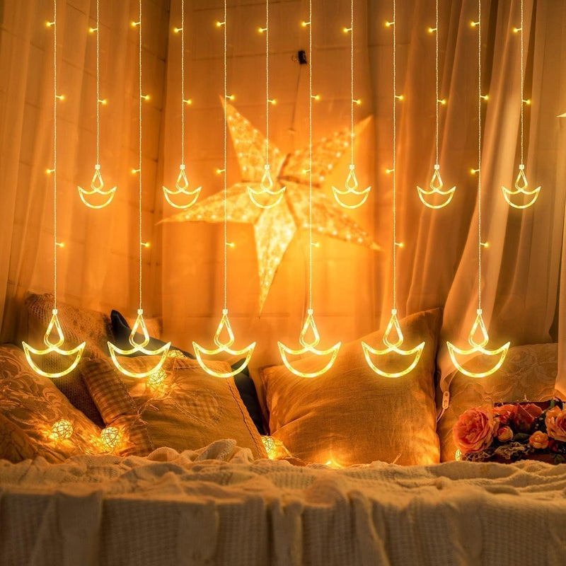 FLYNGO FLYNGO 12 Diya 138 LED Curtain String Lights for Decoration Window Lights with 8 Flashing Modes for Home Decoration for Diwali Wedding Party Christmas Balcony Warm White Diya Diya  - Image 1