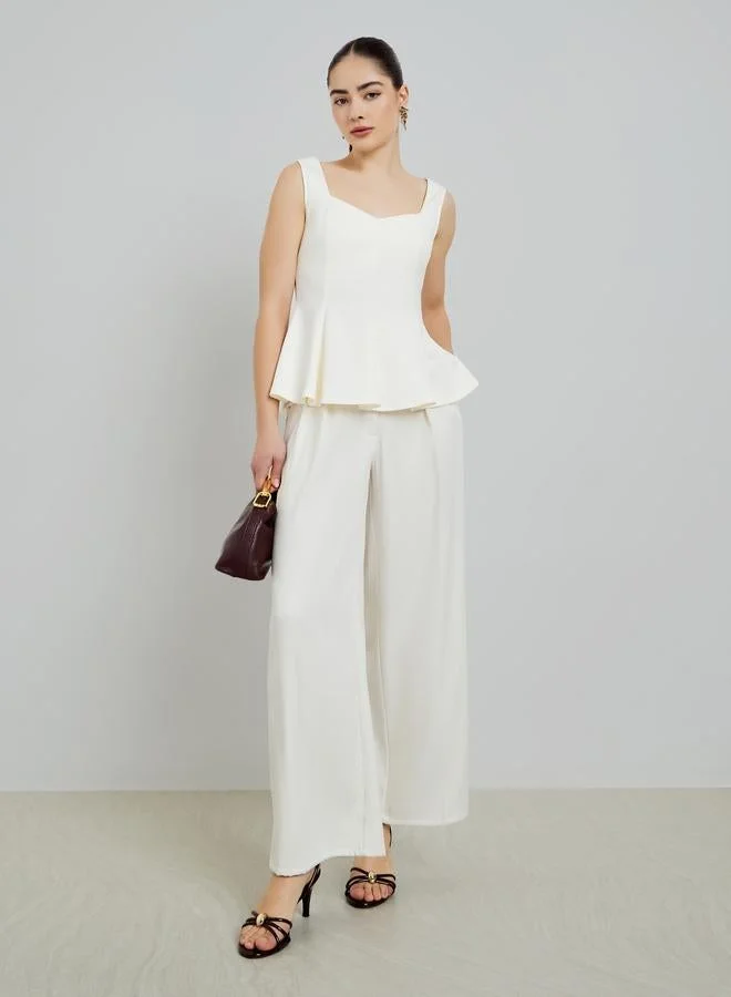 Styli Off White Sleeveless Peplum Top