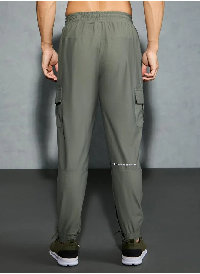تكنوسبورت Technosport Solid Regular Fit Cargo Joggers with Drawstring