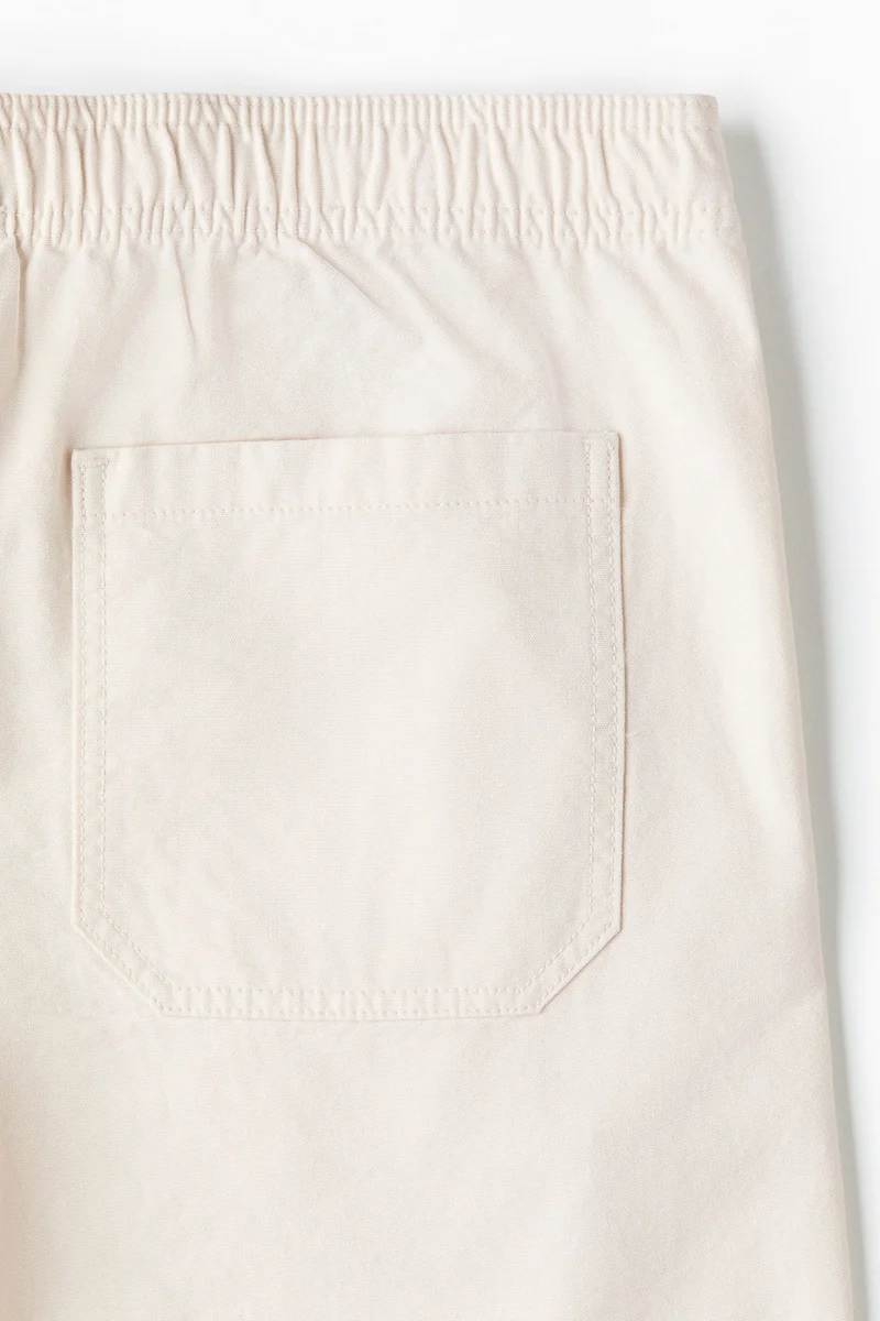 H&M  Loose Fit Cotton canvas trousers for Men | Best Price UAE