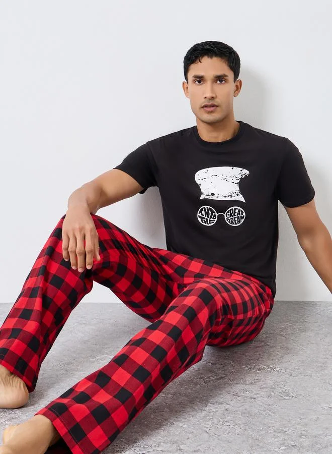 Styli Men Graphic Print Short Sleeve T-Shirt and Checked Pyjama Set