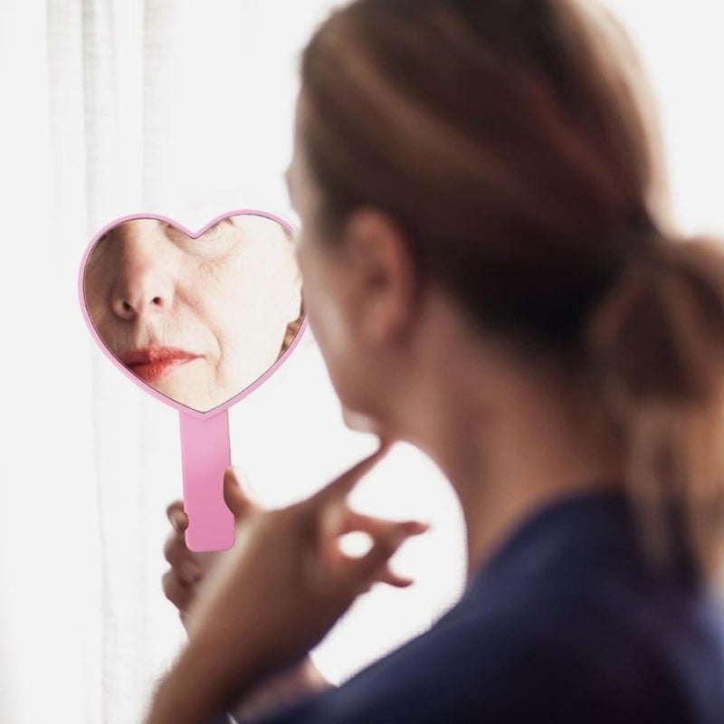 مرايا مكياج قلبية مكونة من 4 قطع، مرايا يدوية محمولة من البلاستيك، مناسبة للنساء للاستخدام أثناء السفر والحياة اليومية، بألوان البنفسجي والوردي. - Image 4