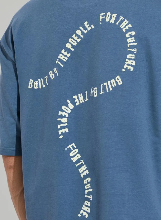 Styli  Oversized Chest & Back Screen Print Cotton Terry Crew Neck T-shirt for Men | Best Price UAE