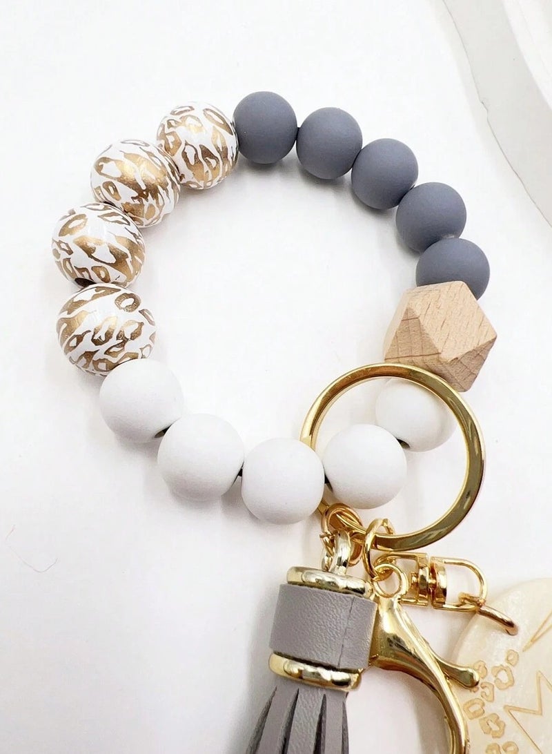 Elegant Keychain with Beaded Charm and Tassel – Gray and Gold - Image 2