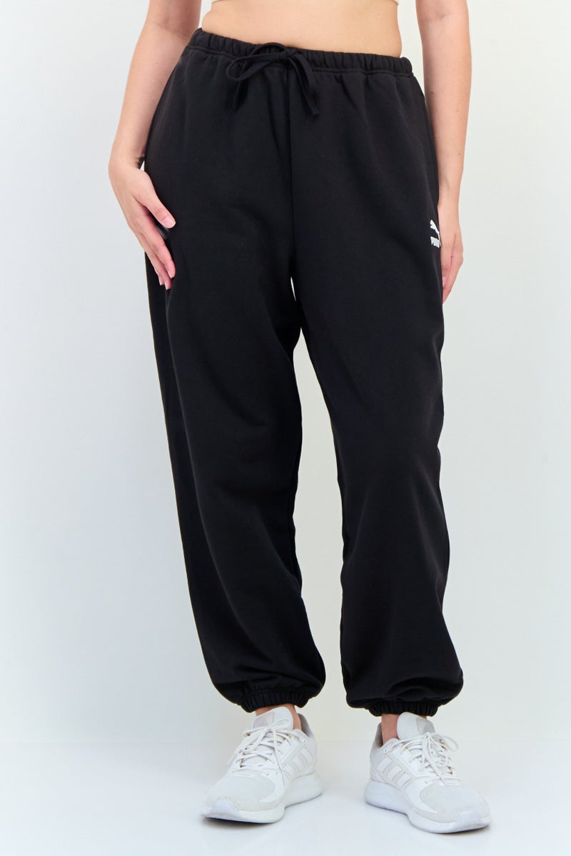 PUMA Women Relaxed Fit Training Sweatpants, Black - Image 1