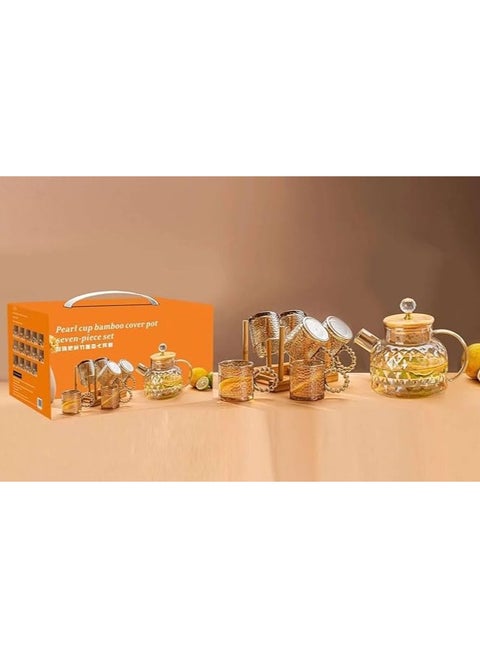 Set of 7 Glass Teapots with Bamboo Lid, 6 Glass Cups with Handle, Honey Color with Elegant Wooden Stand The teapot is made of high quality clear Pyrex glass which allows you to see the drinks inside and adds an attractive visual touch especially when serving herbal tea or colored drinks, The lid of the teapot is made of bamboo and comes with a crystal handle which makes it easy to open and close and adds a touch of luxury, The cups are designed with fine details on the glass which makes them more heat resistant and provides a comfortable feeling to the touch, The wooden stand displays the cups elegantly