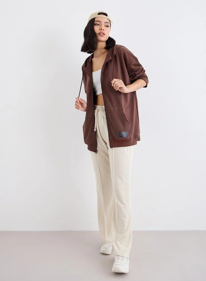 ستايلي Styli Oversized Zip Through Hoodie with Badge Detail