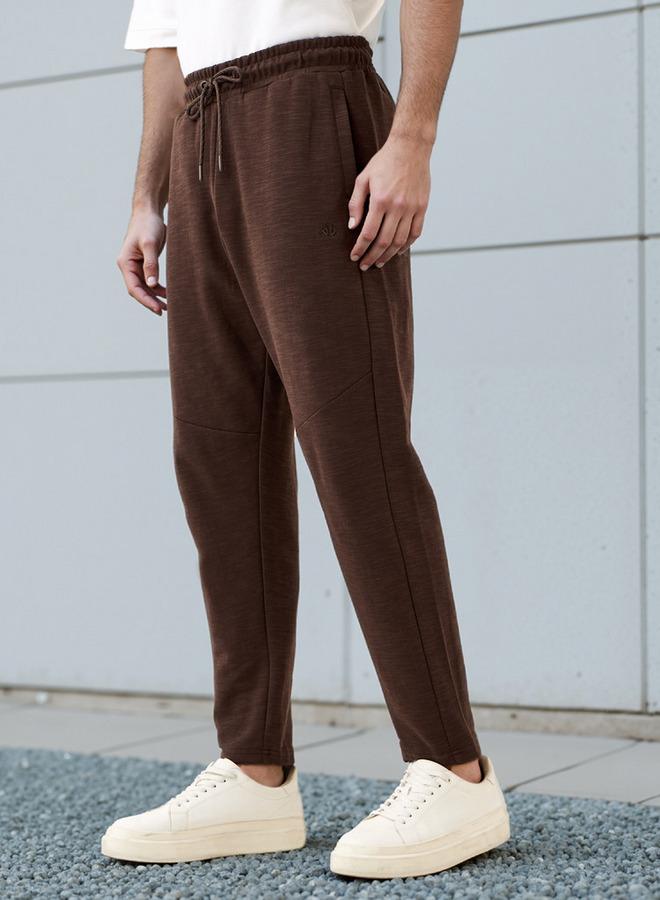 كابا بنطلون رياضي مخطط برباط وجيوب - Image 1