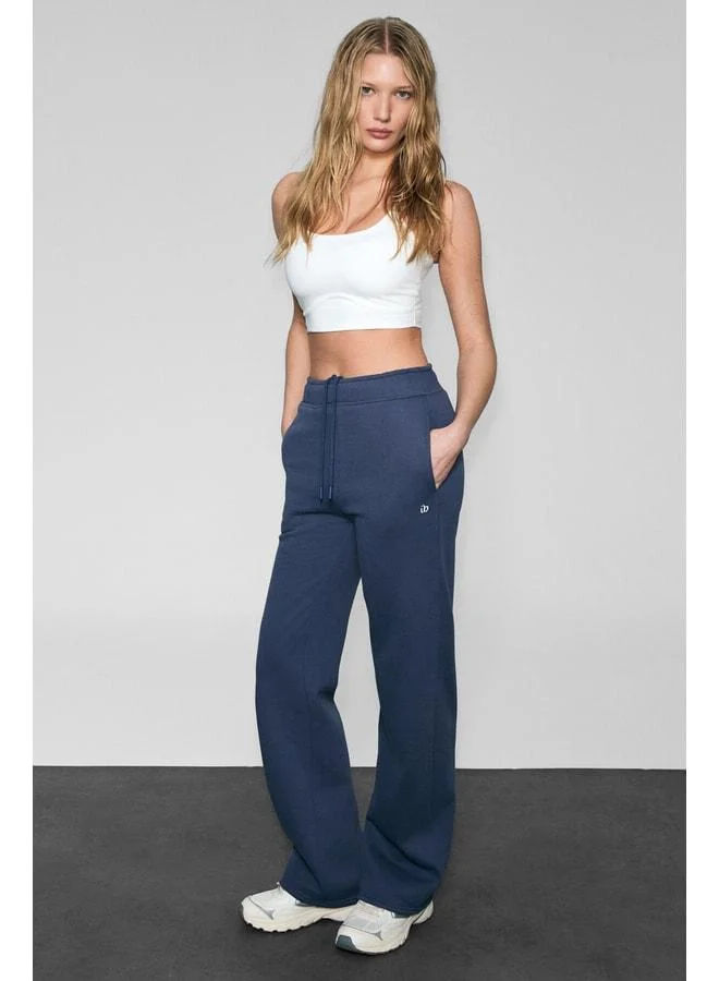 Urban Beat  CLAYT Women’s Fleece-Lined Soft-Fabric Relaxed Navy Blue Sweatpants with Double Pockets and Print Detailing. for Women | Best Price UAE