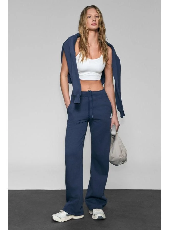 URBAN BEAT CLAYT Women’s Fleece-Lined Soft-Fabric Relaxed Navy Blue Sweatpants with Double Pockets and Print Detailing.