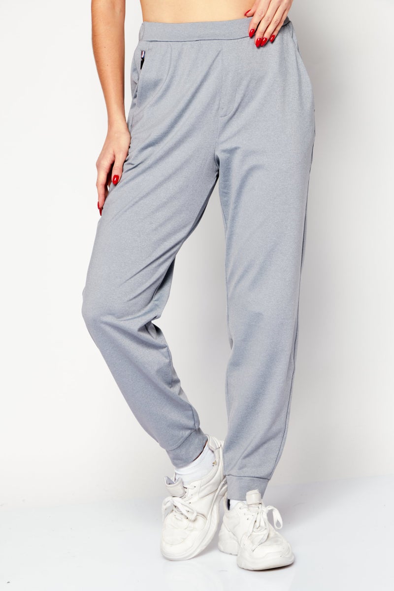 Fourlaps سروال تدريب ضيق للنساء، رمادي فاتح - Image 1