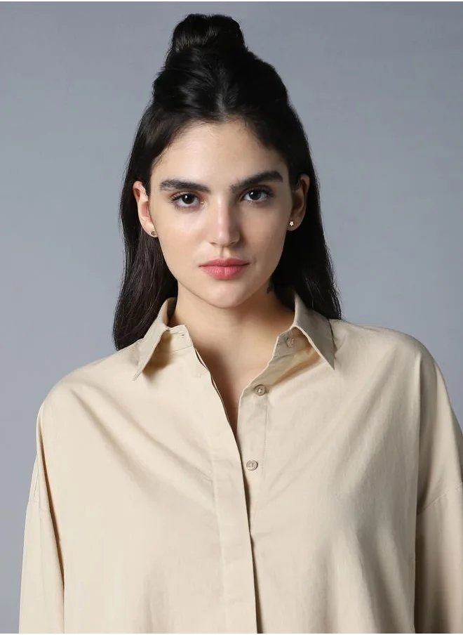 HIGH STAR Stay effortlessly stylish with this comfortable Beige Oversized Shirts Solid design crafted from 100% Cotton featuring Long Sleeves with Button closure.