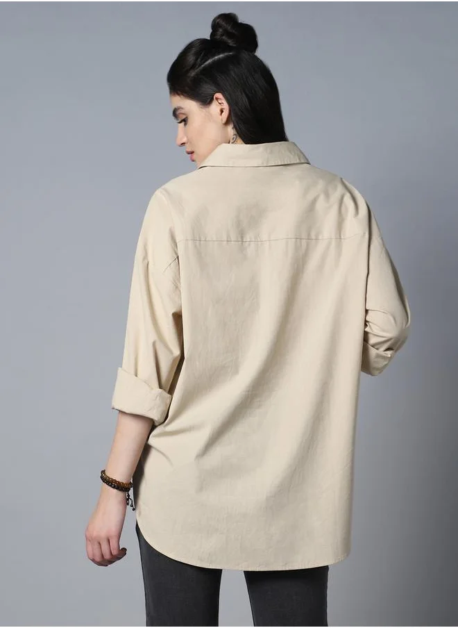 HIGH STAR Stay effortlessly stylish with this comfortable Beige Oversized Shirts Solid design crafted from 100% Cotton featuring Long Sleeves with Button closure.