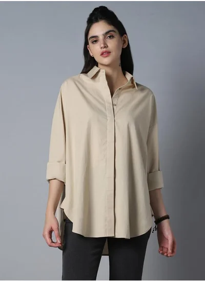 HIGH STAR Stay effortlessly stylish with this comfortable Beige Oversized Shirts Solid design crafted from 100% Cotton featuring Long Sleeves with Button closure.