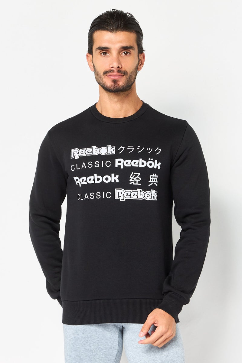 Reebok Men Sportswear Fit Long Sleeve Outdoor Sweatshirt, Black - Image 1
