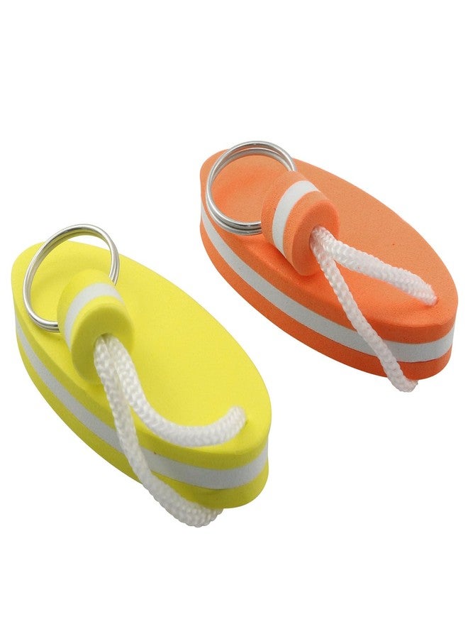 DGHAOP 2pcs Floating Key Ring Glow in Dark, Yellow and Orange Water Buoyant Key Chain, Boat Key Chains for Fishing, Sailing, Surfing, Swimming, Water Sports - Image 1