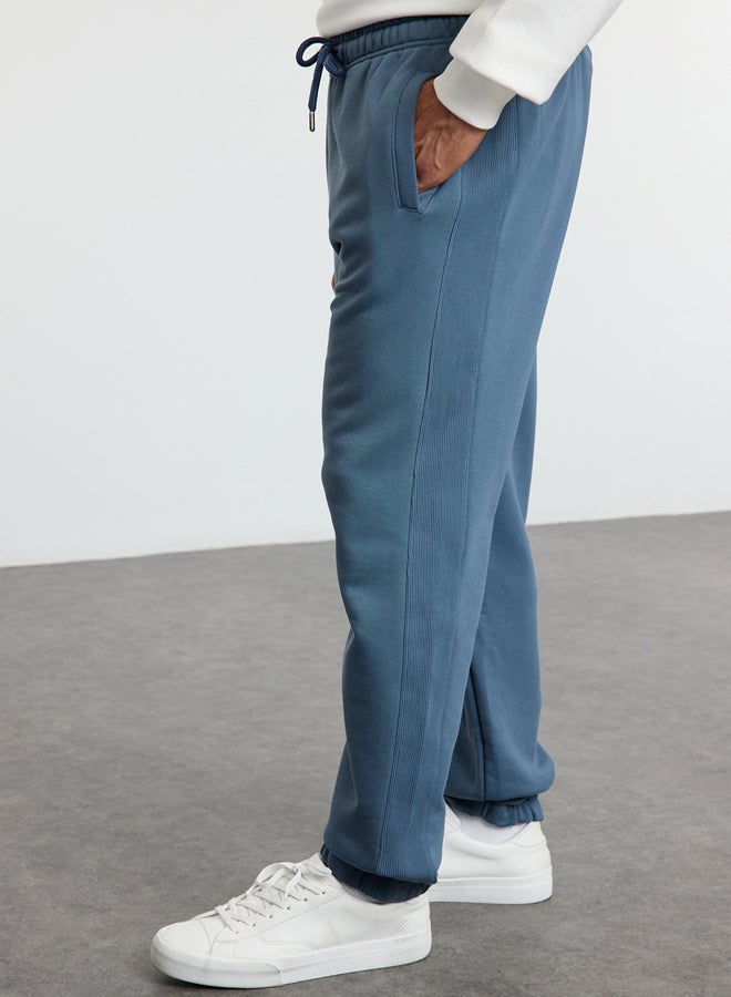 trendyol Indigo Oversize/Wide Cut Fabric Mix Sweatpants TMNAW25EA00012 - Image 1