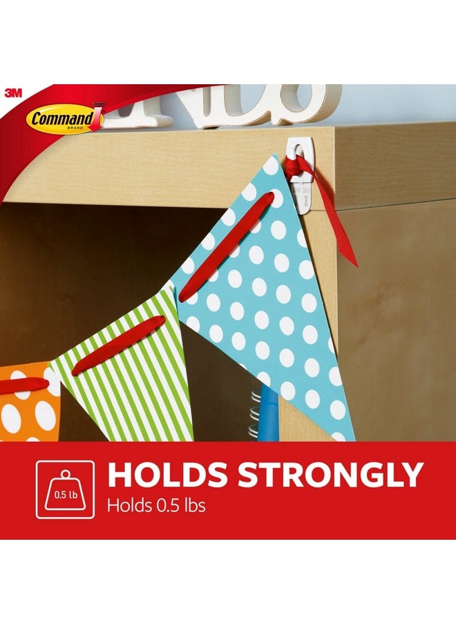 Command Command Damage Free Hanging Light Clips with Adhesive Strips, No Tools Mini Wall Hooks for Hanging Decorations in Living Spaces, 18 White Wall Hooks and 24 Command Strips  - Image 3