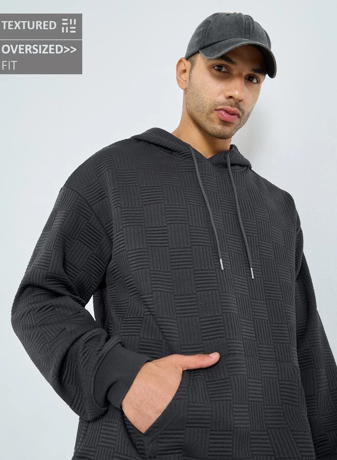 ستايلي هودي واسع بتفاصيل بارزة الملمس