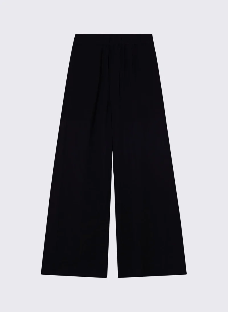 ليو جو Flared trousers with branded buttons