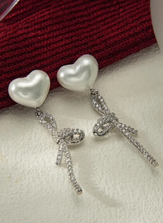 تايك تو أقراط عقدة مزينة بلؤلؤ صناعي شكل قلب