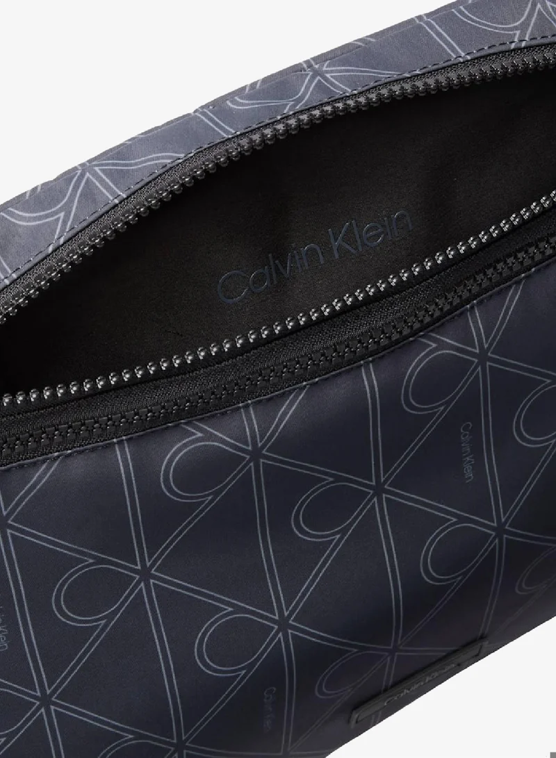 Calvin Klein Pirate Black Printed Emblem Sling Shoulder Bag for Men | Best Price UAE