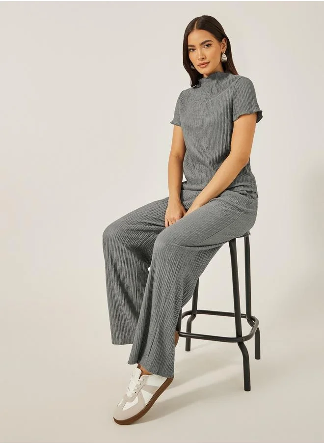 ستايلي Textured High Neck Top with Wide Leg Pants Co-Ords