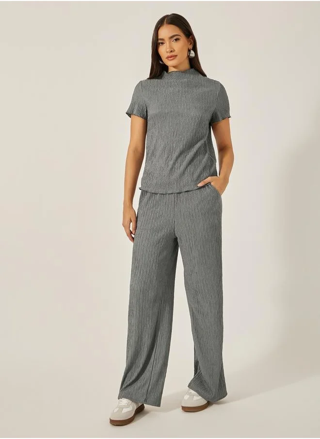 ستايلي Textured High Neck Top with Wide Leg Pants Co-Ords