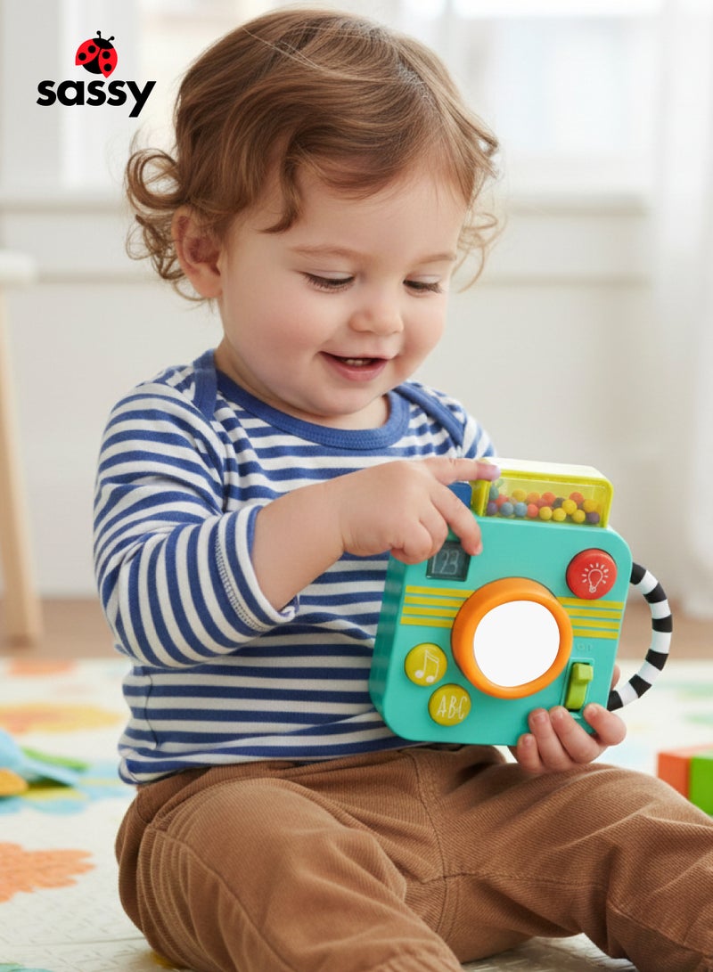 Sassy Musical Baby Toy Camera with Pop-Up Surprise | Shutter Phrases + 2 Song Buttons | Mirror Ratchet Lens + Flash Switch | Easy Grip Handle | 6-24 Months | 14 x 10 x 6 CM - Image 2