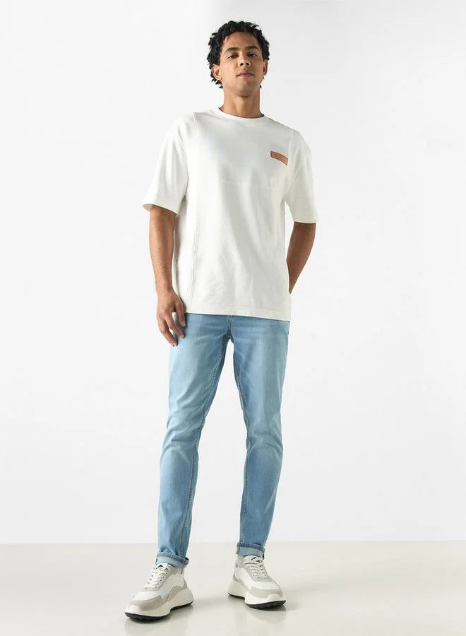 لي كوبر بنطلون جينز بقصة ضيّقة وخصر متوسط الارتفاع بجيوب من لي كوبر