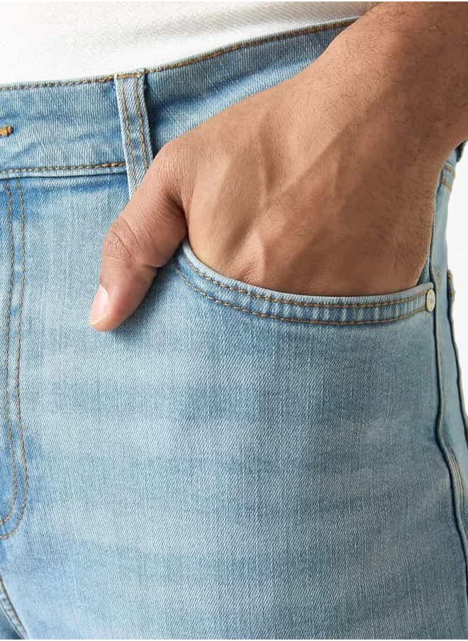 لي كوبر بنطلون جينز بقصة ضيّقة وخصر متوسط الارتفاع بجيوب من لي كوبر