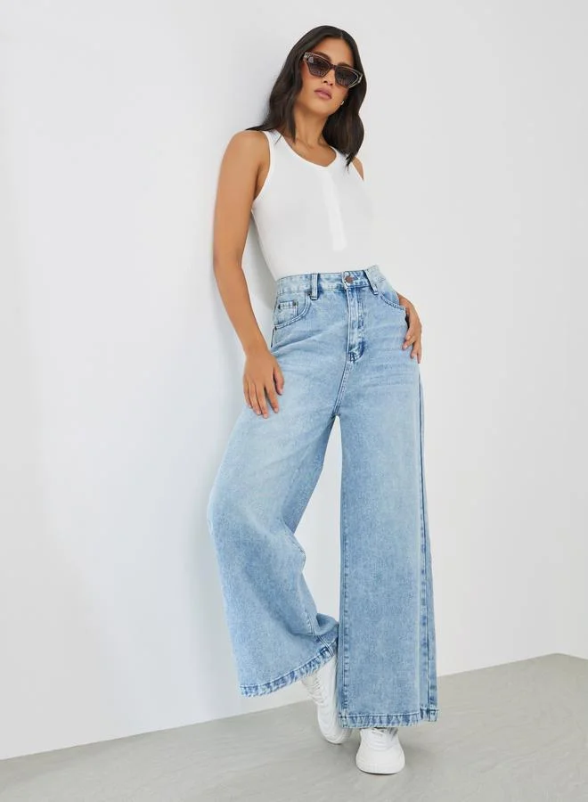 ستايلي Styli Mid Rise Wide Leg Faded Jeans