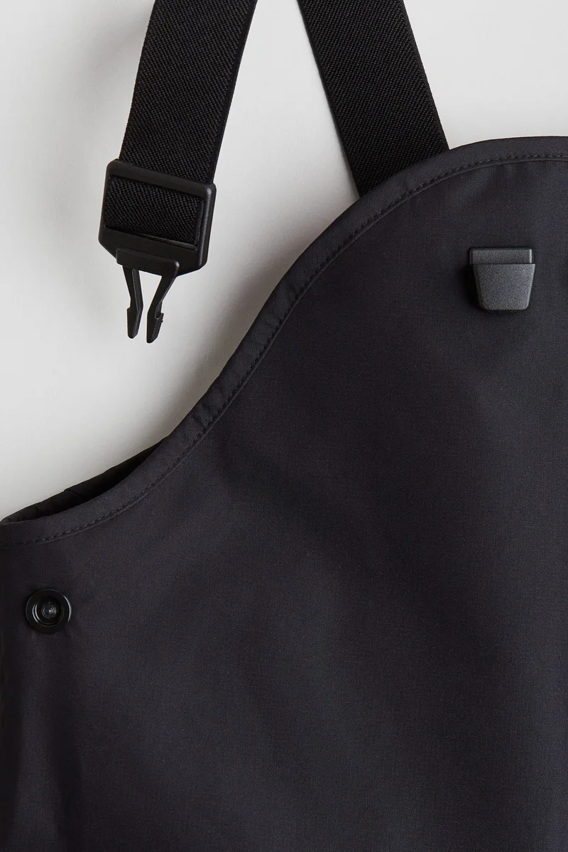 اتش اند ام بنطلون من نسيج مقاوم للمطر