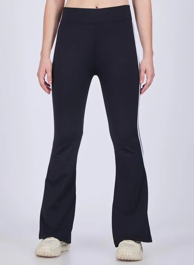 OUTZIDR  Black Flared Contrast Striped Leggings for Women | Best Price UAE