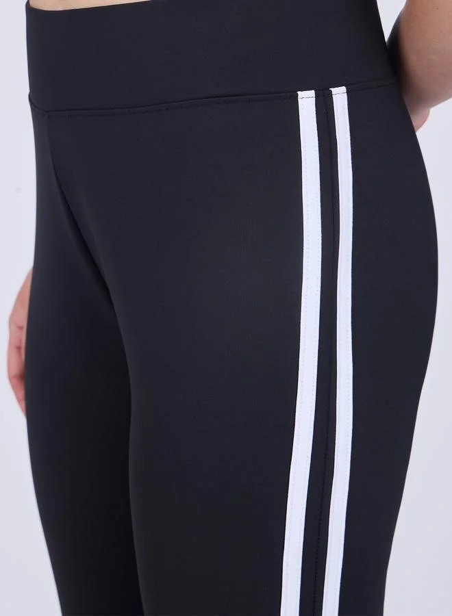 OUTZIDR  Black Flared Contrast Striped Leggings for Women | Best Price UAE