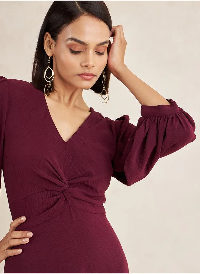 فيميلا Front Twisted Long Sleeves A-Line Maxi Dress by Styli