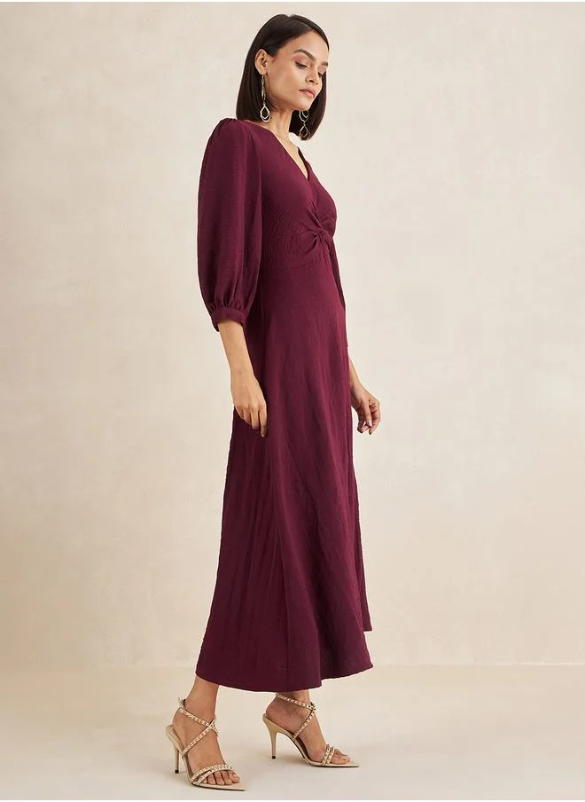 فيميلا Front Twisted Long Sleeves A-Line Maxi Dress by Styli