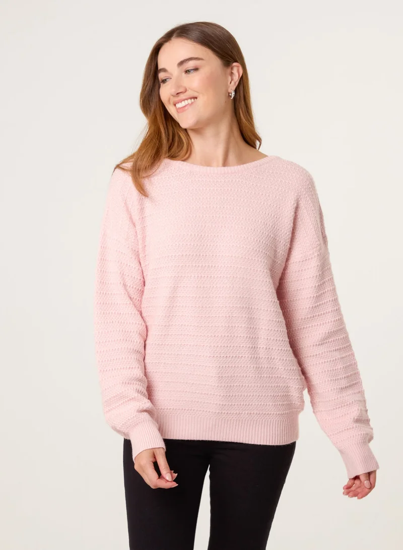 بلو فانيلا كنزة بياقة مستديرة وتفاصيل فيونكة خلفية