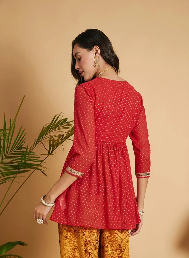 SASSAFRAS Spot Foil Print  Lace Trim Wrap Peplum Top by Styli